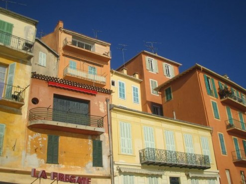 Shutters on the weathered buildings of Villefranche sur Mer, France