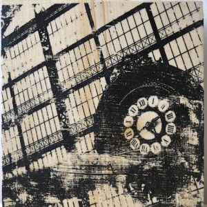 Distressed handmade print of the Musee d'Orsay station clock in Paris France