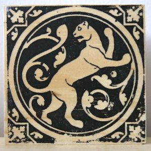 medieval lion, mountain lions, sainte chapelle, paris france, medieval tiles, religious iconography, circles and geometric designs, inlaid inlay floor tiles